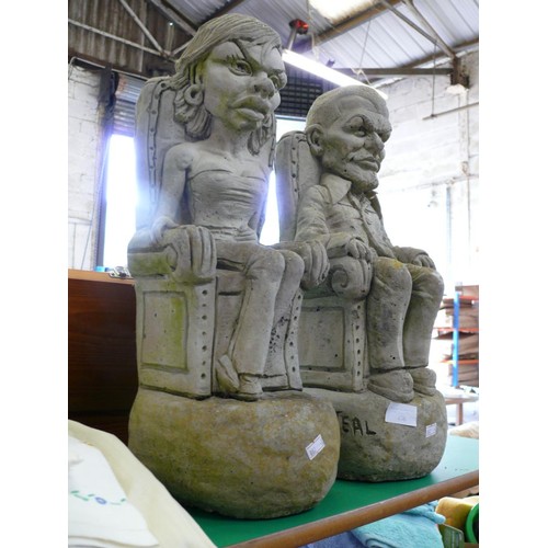 471 - A PAIR OF CONCRETE GARDEN FIGURES 50CMS HIGH,  'VICTORIA AND DAVID BECKHAM' SIGNED A. TEAL