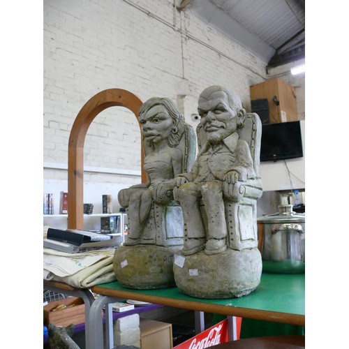 471 - A PAIR OF CONCRETE GARDEN FIGURES 50CMS HIGH,  'VICTORIA AND DAVID BECKHAM' SIGNED A. TEAL