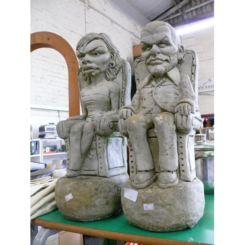 471 - A PAIR OF CONCRETE GARDEN FIGURES 50CMS HIGH,  'VICTORIA AND DAVID BECKHAM' SIGNED A. TEAL