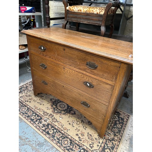 467 - Edwardian Oak chest of three drawers with panelled sides. Original handles in the Art Nouveau style