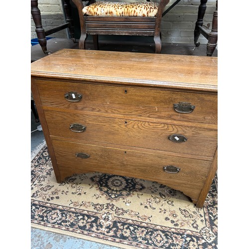 467 - Edwardian Oak chest of three drawers with panelled sides. Original handles in the Art Nouveau style