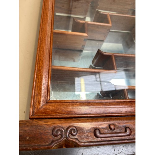 252 - A late 20th Century Chinese collectors cabinet with hinged glass door and mirrored back. Ideal for d... 