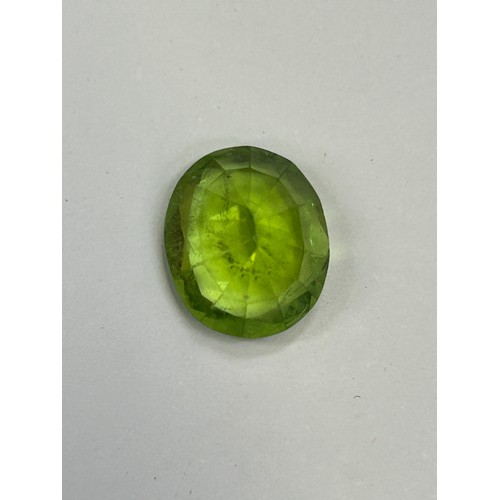 45C - Oval cut peridot semi-precious gemstone 12mm x 10mm