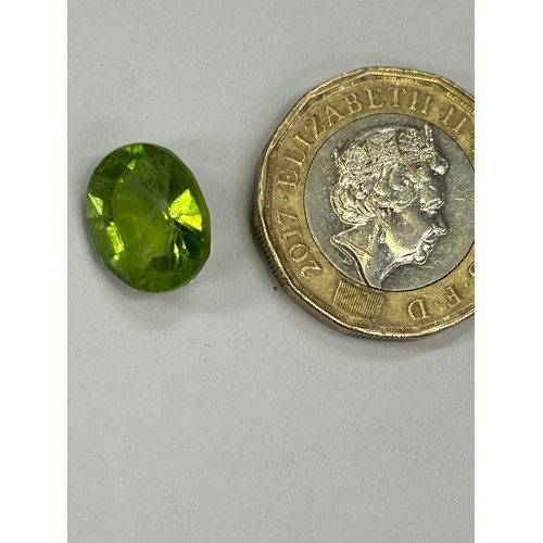 45C - Oval cut peridot semi-precious gemstone 12mm x 10mm