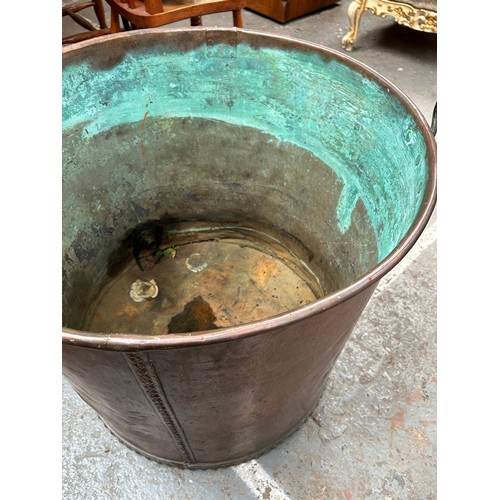 432 - Large Victorian Copper Water Butt - riveted joins and brass tap with porcelain handle. 27