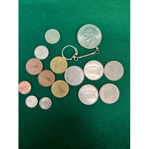 93A - Foreign Coins including an American 1976 Liberty Peace Bell Dollar in a keyring and 14 Irish Coins (... 