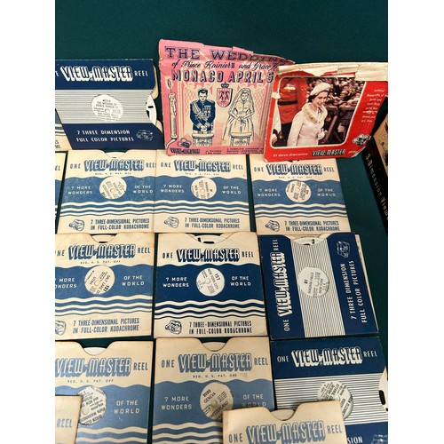 338 - Two Viewmaster 3 dimensional viewers with a large quantity of picture reel slides including Queen El... 