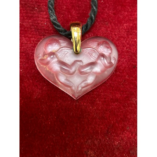 50F - A beautiful Lalique crystal winged cherub pendant with gold bale. Signed to the glass and on the bal... 