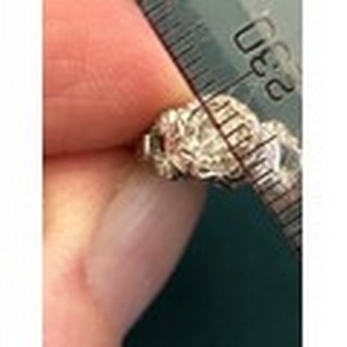 41F - A stunning 14ct gold ring with solitaire diamond  0.8ct-1ct  - set in a raised platinum gallery. The... 