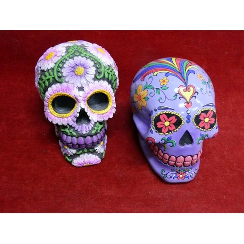 69 - 2 VERY COLOURFUL AND DECORATIVE SKULLS (ONE IS A MONEYBOX)