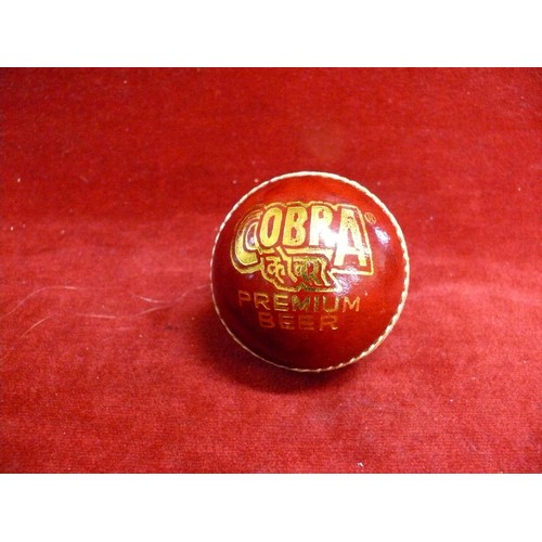 71 - COBRA BEER COMMEMORATIVE CRICKET BALL