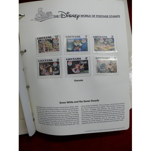 79 - THE DISNEY WORLD OF POSTAGE STAMPS - 2 FOLDERS