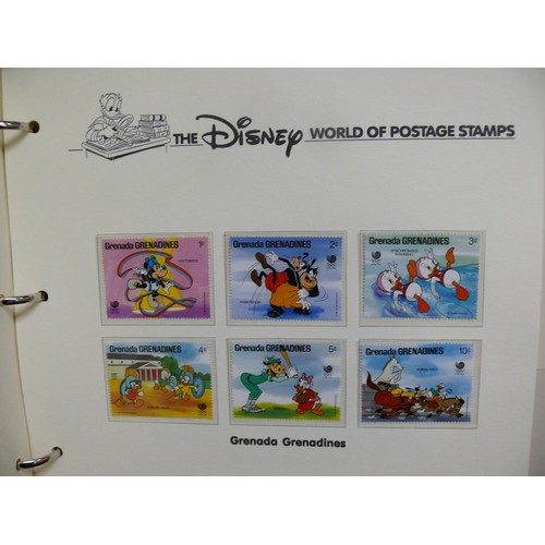 79 - THE DISNEY WORLD OF POSTAGE STAMPS - 2 FOLDERS