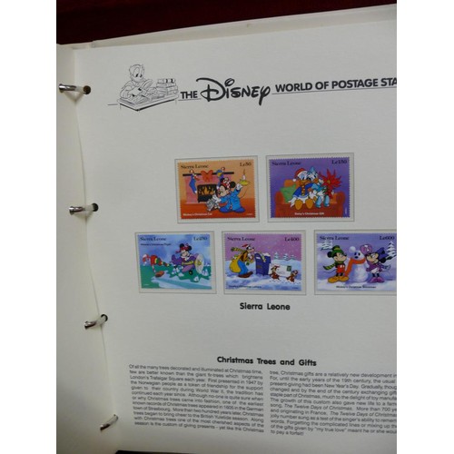 79 - THE DISNEY WORLD OF POSTAGE STAMPS - 2 FOLDERS