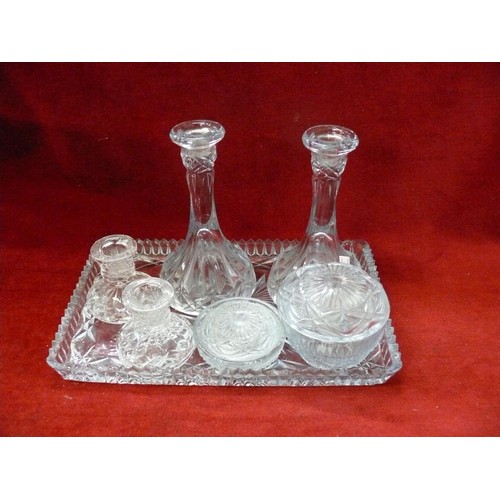 106 - A VINTAGE BLUE GLASS DRESSING TABLE SET PLUS A PAIR OF CRYSTAL CANDLESTICKS