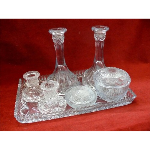 106 - A VINTAGE BLUE GLASS DRESSING TABLE SET PLUS A PAIR OF CRYSTAL CANDLESTICKS