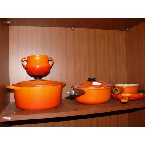 141 - 3 LE CRUESET VOLCANIC ORANGE PANS 2 WITH LIDS AND 1 FRYING PAN