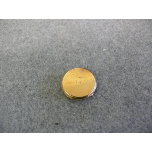 22 - 9 CT GOLD BACK AND FRONT ROUND LOCKET  WEIGHS 4 GRMS TOTAL