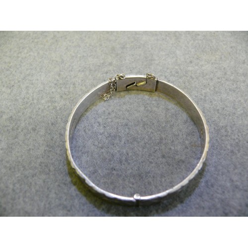 10 - STERLING SILVER BANGLE WITH HALLMARKS FOR  MONOMIL LTD BIRMINGHAM 1977