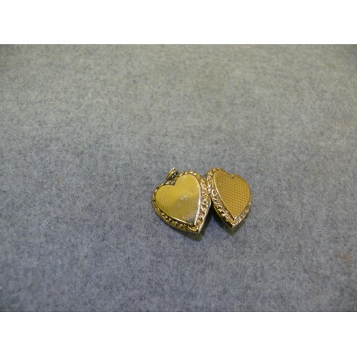 23 - 9CT GOLD HEART SHAPED LOCKET WEIGHS 4 GRMS