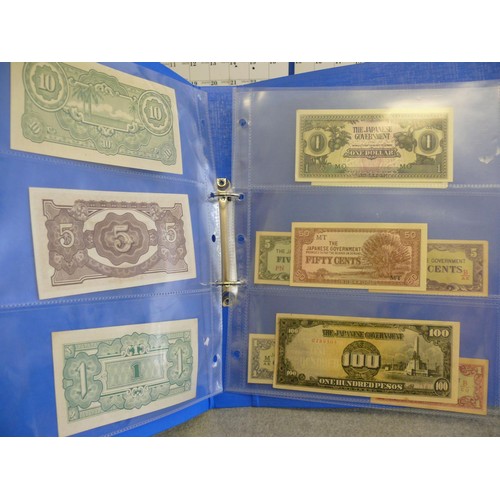 53 - A FOLDER OF 11 UNCIRCULATED JAPANESE BANK NOTES