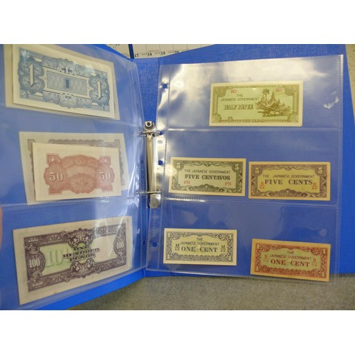 53 - A FOLDER OF 11 UNCIRCULATED JAPANESE BANK NOTES