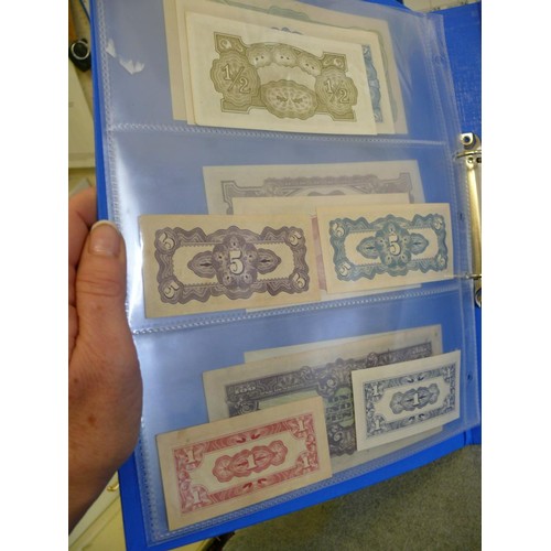 53 - A FOLDER OF 11 UNCIRCULATED JAPANESE BANK NOTES