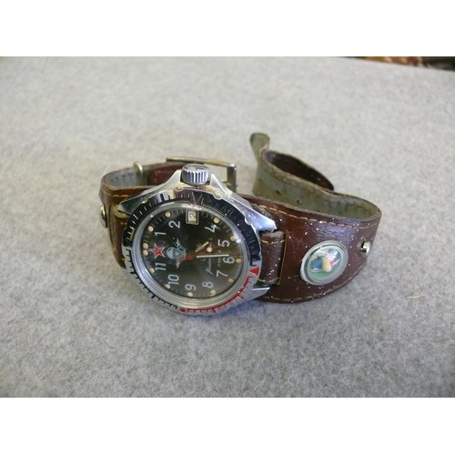 41 - A RUSSIAN ARMY WRISTWATCH BY VOSTOK KOMANDIRSKIE WITH ORIGINAL LEATHER STRAP