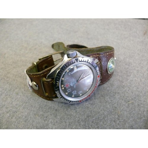 41 - A RUSSIAN ARMY WRISTWATCH BY VOSTOK KOMANDIRSKIE WITH ORIGINAL LEATHER STRAP