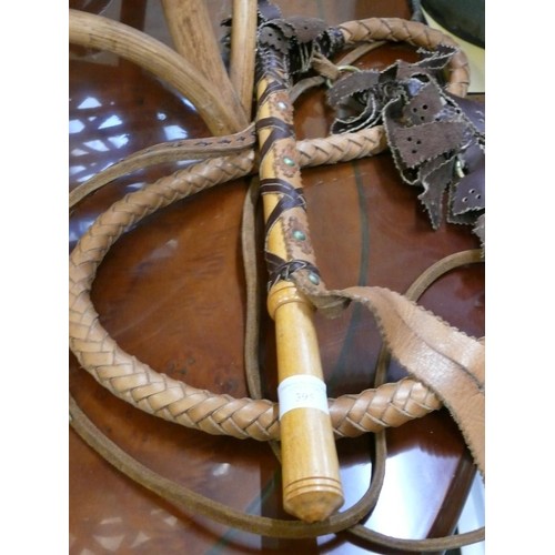 395 - DECORATIVE LEATHER HORSE WHIP