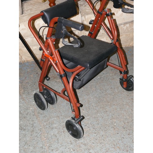 442 - MOBILITY WALKER BY UNISCAN WITH SEAT AND BRAKES PLUS AN UNDERBED TRAY ON WHEELS