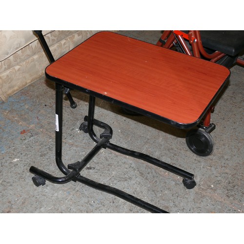 442 - MOBILITY WALKER BY UNISCAN WITH SEAT AND BRAKES PLUS AN UNDERBED TRAY ON WHEELS