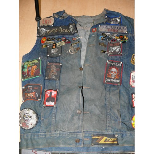 140 - DENIM WAIST COAT ADORNED IN HEAVY METAL BADGES BOTH METAL AND FABRIC