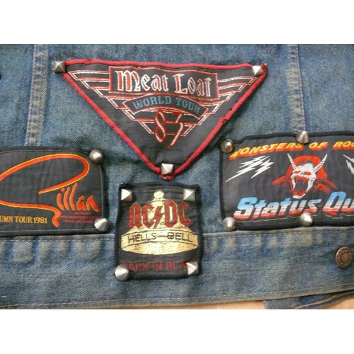 140 - DENIM WAIST COAT ADORNED IN HEAVY METAL BADGES BOTH METAL AND FABRIC