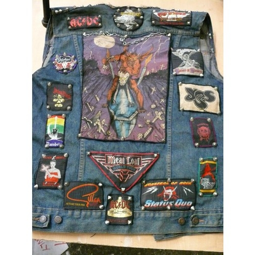 140 - DENIM WAIST COAT ADORNED IN HEAVY METAL BADGES BOTH METAL AND FABRIC