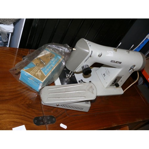 478 - FRISTER AND ROSSMAN SEWING MACHINE AND TABLE WITH FOOT PEDAL AND ACCESSORIES