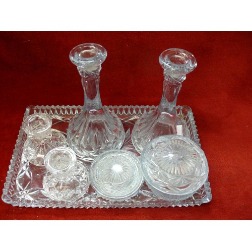 106 - A VINTAGE BLUE GLASS DRESSING TABLE SET PLUS A PAIR OF CRYSTAL CANDLESTICKS