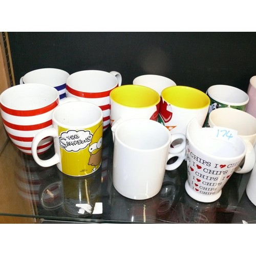 174 - A SHELF OF VARIOUS GOOD QUALITY MUGS, SOME NEW