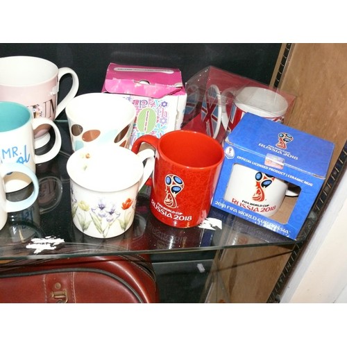 174 - A SHELF OF VARIOUS GOOD QUALITY MUGS, SOME NEW