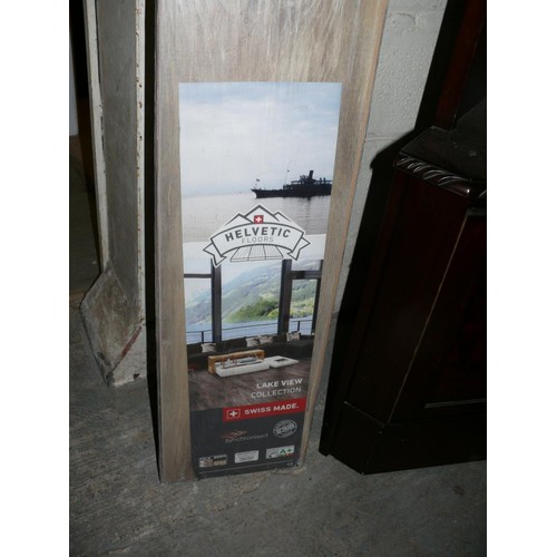 435 - A NEW PACK OF SWISS MADE LAMINATE FLOORING