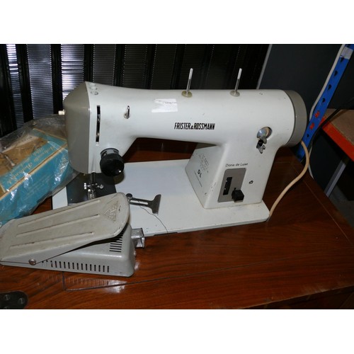 478 - FRISTER AND ROSSMAN SEWING MACHINE AND TABLE WITH FOOT PEDAL AND ACCESSORIES