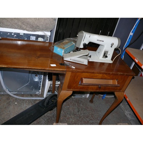 478 - FRISTER AND ROSSMAN SEWING MACHINE AND TABLE WITH FOOT PEDAL AND ACCESSORIES