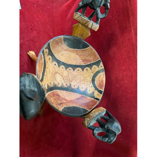 98 - AFRICAN WOODEN BOWL ON A FOLDING TRIPOD STAND WITH ELEPHANT FINIALS