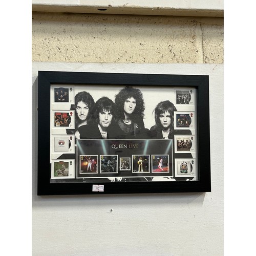 152 - FRAMED QUEEN LIVE POSTAGE STAMPS