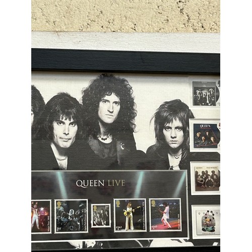 152 - FRAMED QUEEN LIVE POSTAGE STAMPS