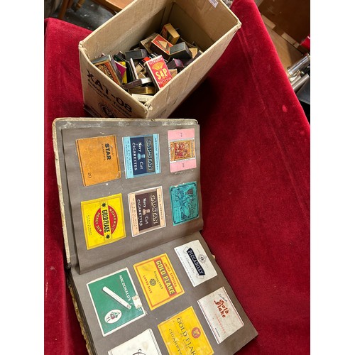 157 - COLLECTION OF VINTAGE CIGARETTE PACKETS IN AN ALBUM AND A BOX OF VINTAGE MATCHBOXES - OVER 100 IN TO... 