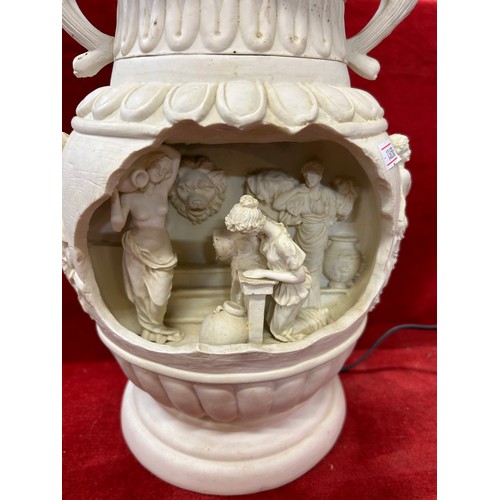 120 - A NEOCLASSICAL URN WATER FEATURE WITH A THREE DIMENSIONAL PANEL OF ROMAN LADIES WITH WATER URNS