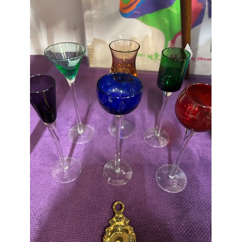 141 - A HARLEQUIN SET OF 6 LIQUEUR GLASSES ON LONG STEMS