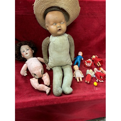 177 - An antique German bisque headed doll with composition body AF. The head with glass eyes, makers mark... 