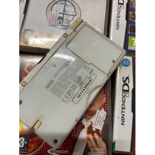 145 - A NINTENDO DS WITH 6 GAMES INCLUDING PROFESSOR LAYTON & PANDORA'S BOX, SPECTRE'S CALL ETC